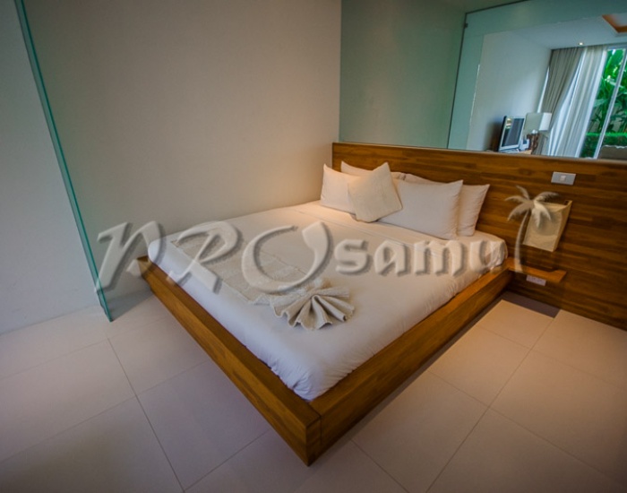 Спальня в апартаментах на пляже Банг Рак HR0182